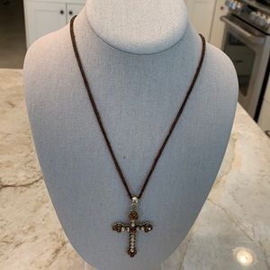 1772 crystal-like studded cross with leather strap. Gently worn strap.